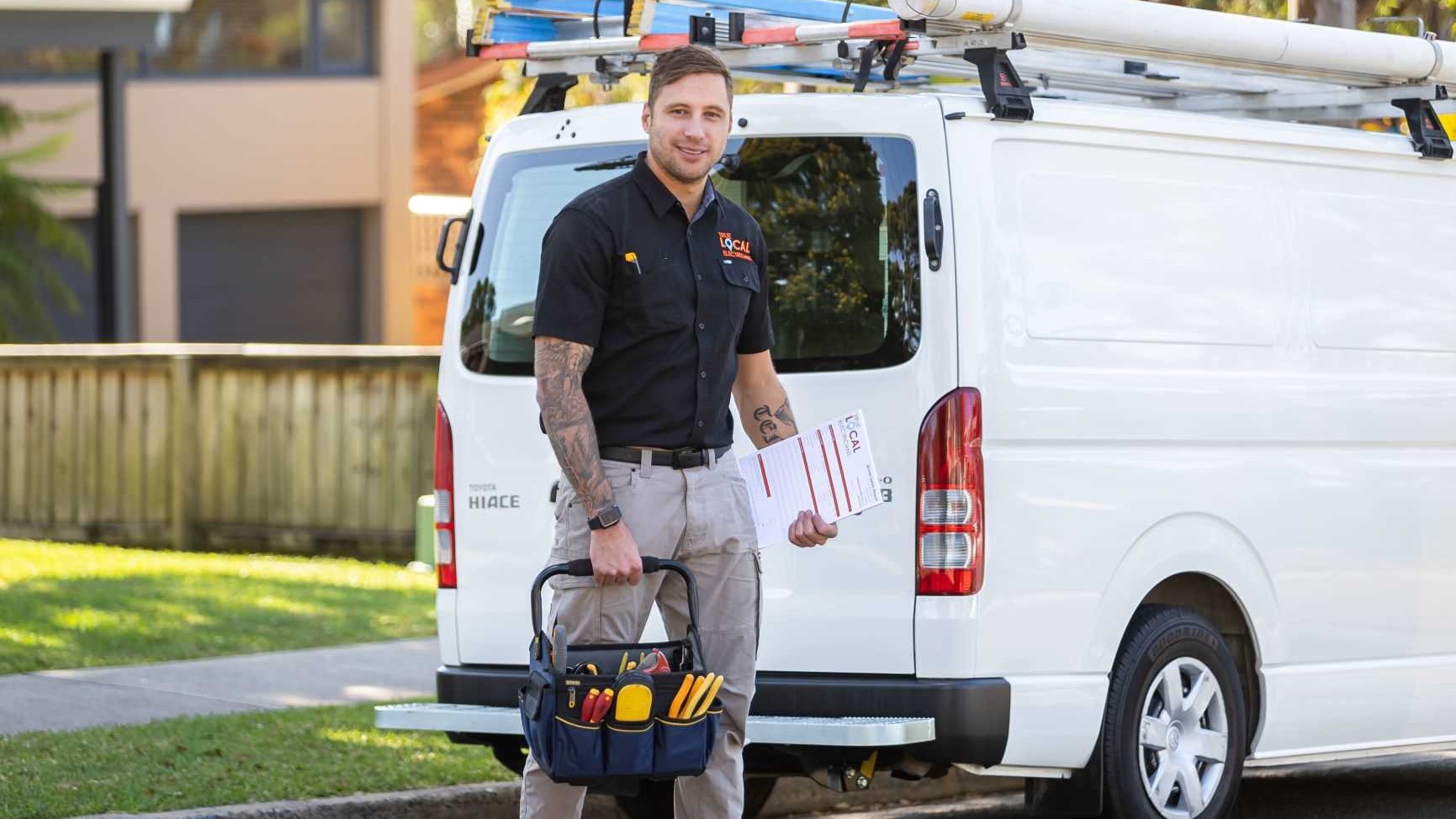 Michael the electrician from TL Electricians Campbelltown walking to a residential customers house